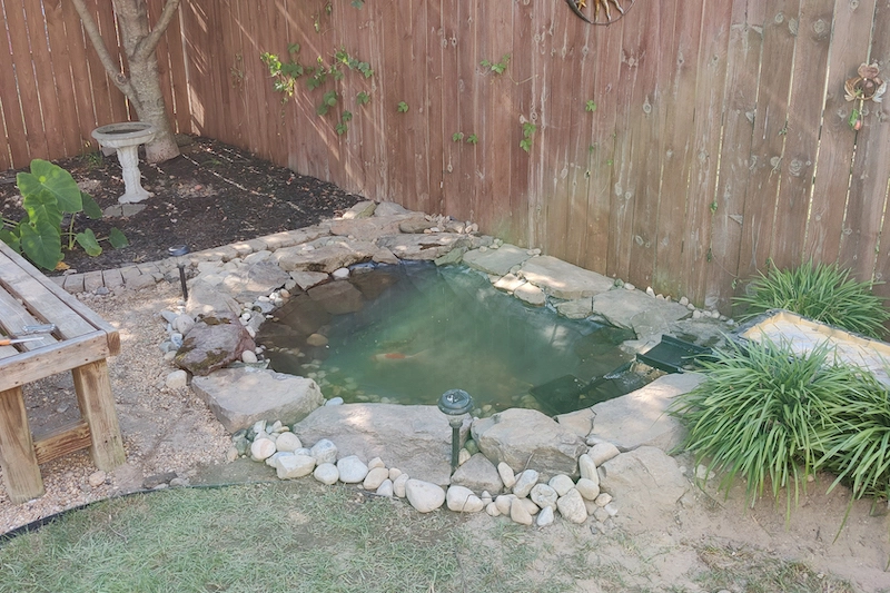 small koi pond rebuild with pa field stone boulder, epdm liner and gravel